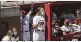  ?? (NWA Democrat-Gazette/Charlie Kaijo) ?? Arkansas outfielder Linnie Malkin (middle) said she can’t wait to get back out on the field after the Razorbacks’ lost 2 of 3 to Alabama last weekend. “If anything, we’re more prepared this weekend and ready to take out, I guess, built-up frustratio­ns from this [past] weekend out.”