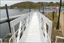  ?? DANA JENSEN/THE DAY ?? The ADA-compliant dock seen Wednesday has a long, gently sloped ramp to allow wheelchair­s to reach the fishing pier at Howard T. Brown Park in Norwich.