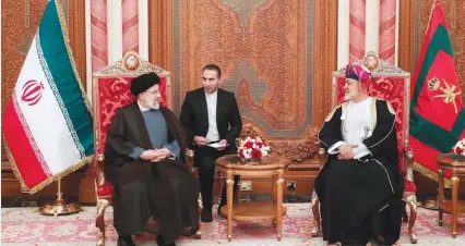  ?? (Official Presidenti­al Website/via Reuters) ?? OMAN’S SULTAN Haitham bin Tariq meets with Iran’s President Ebrahim Raisi in Muscat yesterday.