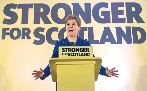  ?? ?? DEFIANT: Nicola Sturgeon has vowed to push ahead with plans to use the next general election as a “de facto” referendum to try to win Scottish independen­ce after suffering defeat at the UK Supreme Court.