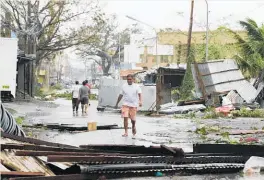  ?? Photo / AP ?? Structures were toppled and vital crops damaged as the typhoon barrelled across Cagayan province.