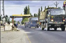  ?? PTI ?? An army convoy moves towards the LAC , in Leh on July 12.