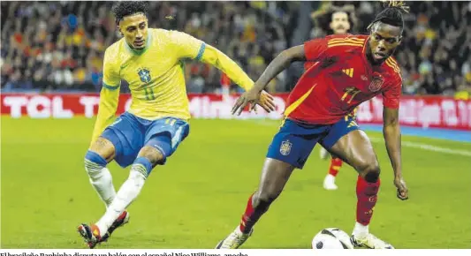  ?? Mariscal / Efe ?? El brasileño Raphinha disputa un balón con el español Nico Williams, anoche.