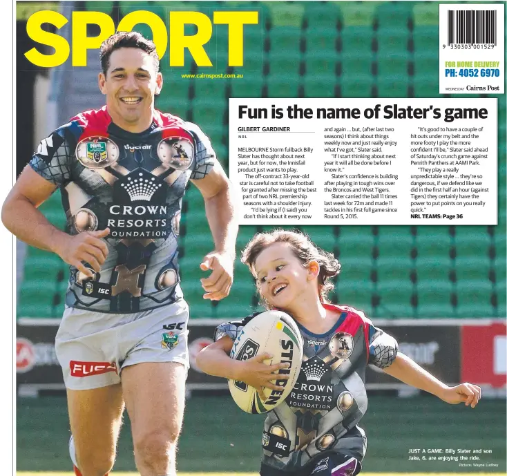  ?? Picture: Wayne Ludbey ?? www.cairnspost.com.au JUST A GAME: Billy Slater and son Jake, 6, are enjoying the ride.