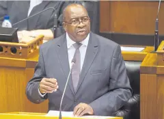  ?? AFP ?? South African Minister of Finance Nhlanhla Nene delivers the 2015 budget speech. He was seen as a stumbling block to some of President Jacob Zuma ‘s pet projects.