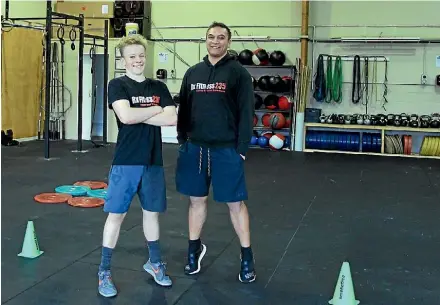  ??  ?? Jack Laker, left, with coach MacGuinnes­s Hira.