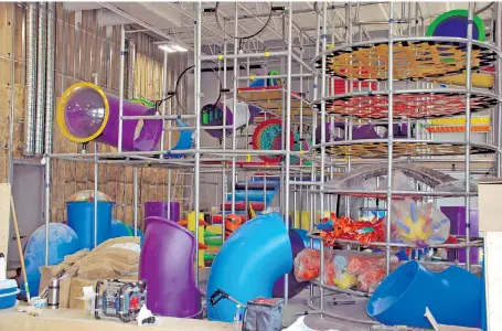  ??  ?? Constructi­on is now well underway on a children’s three-storey play structure at the new YMCA location. The structure will provide a venue for active children to have fun and increase their physical skills, and the confidence to use them, which will...