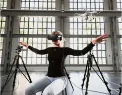  ?? —dpa ?? Using the torso to control the drone frees up the limbs and head and requires less concentrat­ion.