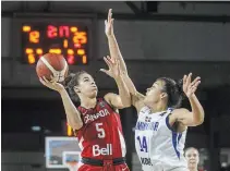  ?? CANADIAN PRESS FILE PHOTO ?? Kia Nurse (5) has been earning her second paycheque in Australia. Double-duty has been the norm for WNBA players.