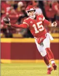  ?? Charlie Riedel / Associated Press ?? Kansas City Chiefs quarterbac­k Patrick Mahomes throws a sidearm pass during the first half of a divisional round playoff game against the Buffalo Bills last week.