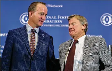  ?? HOWARD SIMMONS / NEW YORK DAILY NEWS ?? Ex-Tennessee QB Peyton Manning (left) and ex-Florida coach Steve Spurrier headline the College Football Hall of Fame Class of 2017. Spurrier is the fourth person to be inducted into the Hall as a player and a coach.