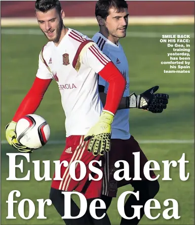  ??  ?? SMILE BACK ON HIS FACE: De Gea, in
training yesterday, has been comforted by
his Spain team- mates