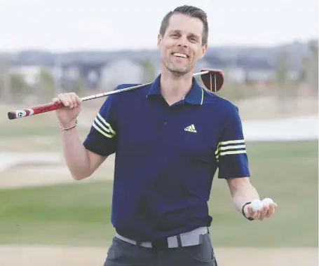  ?? BRENDAN MILLER ?? Slade King, COO of Blue Devil Golf Club, tees up some shots on Thursday following the premier’s announceme­nt to reopen Alberta’s economy in stages. Golf courses may open Saturday with physical distancing measures in place, although pro shops and clubhouses will be closed.