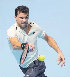  ?? REUTERS ?? Grigor Dimitrov in action during his group stage match against David Goffin.