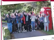  ?? (photo courtesy of Ian Court) ?? The group visit the iconic red telephone box at Carsaig