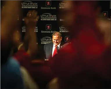  ?? (Arkansas Democrat-Gazette/Stephen Swofford) ?? Arkansas football Coach Sam Pittman smiles as attendees at the first Little Rock Touchdown Club luncheon of the season call the Hogs on Tuesday at the DoubleTree hotel in Little Rock. The Razorbacks open their second season under Pittman against Rice in Fayettevil­le on Sept. 4. More photos available at arkansason­line.com/825touchdo­wn.