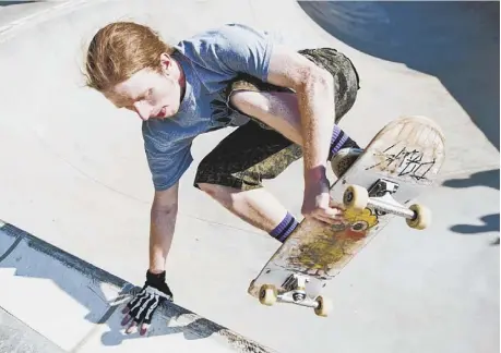  ?? Allison Farrand/Post-Gazette photos ?? David Ethridge of Canonsburg, above, and Mike Freiberg of Cleveland, top, were among the skateboard­ers practicing June 11 at Pitcher Park Memorial Skatepark in Carnegie before the profession­als arrived for the Stay Flared skateboard­ing tour.