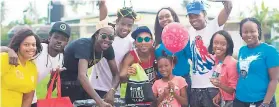  ?? CONTRIBUTE­D ?? Guest artiste Chi Ching Ching (third left) poses with his dancers after his performanc­e at the school party at Old Harbour Primary School in St Catherine. From September to December 2016, approximat­ely 40 primary schools across eastern Jamaica...