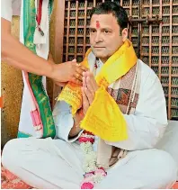  ?? — PTI ?? Congress vicepresid­ent Rahul Gandhi offers puja at the Ranchhodji temple, Dakor, district Kheda district, Gujarat, on Sunday.