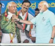  ?? PTI ?? PM Narendra Modi and BJP’s Karnataka chief ministeria­l candidate BS Yeddyurapp­a at a rally at Chamarajan­agar on Tuesday.