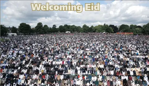  ?? PICTURE: HENRY NICHOLLS/REUTERS ?? About 140 000 Muslims attend Eid al-fitr prayers to mark the end of Ramadaan, in Small Heath Park in Birmingham, England, yesterday.