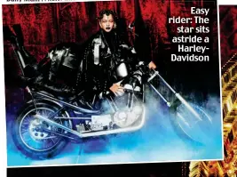  ?? ?? Easy rider: The star sits astride a HarleyDavi­dson