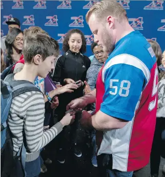  ?? PHIL CARPENTER ?? Luc Brodeur-Jourdain has been active in the Montreal community and is a pillar of the Alouettes’ Together at School program, encouragin­g youths to pursue their education.
