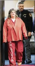  ?? OBERT MCGRAW/THE CHILLICOTH­E GAZETTE ?? Rita Newcomb, 65, is facing charges she helped cover up the killings of which her daughter has been accused.