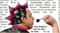  ?? Foto: dpa ?? Peter Wright ist einer der Stars der Szene.