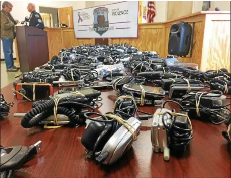  ?? PHOTOS BY TRAVIS CLARK — TCLARK@DIGITALFIR­STMEDIA.COM ?? The Stillwater Police department has collected nearly 4,700 phones since 2003 to donate to victims of domestic violence.