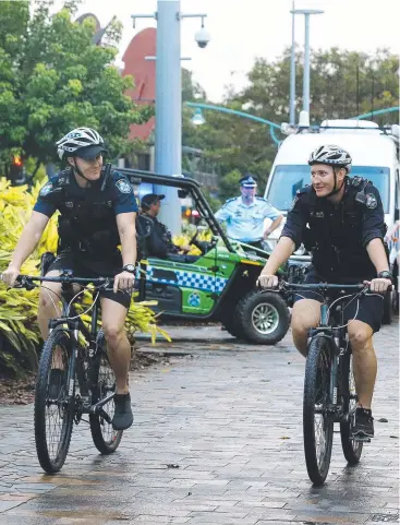  ?? Picture: STEWART McLEAN ?? ON THE BEAT: Constables Leigh Coulter and Will Taylor head off on patrol in Shields Street as part of the CBD crackdown.