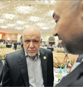  ?? SIDALI DJARBOUB/THE ASSOCIATED PRESS ?? Iranian Oil Minister Bijan Namdar Zanganeh attends the opening session of the 15th Internatio­nal Energy Forum Ministeria­l meeting in Algiers, Algeria on Tuesday. Energy ministers from OPEC and other oil-producing countries are discussing whether to...