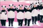  ?? AFP ?? ■ Children dressed up as pandas at the mascot unveiling ceremony of the 2022 Beijing Winter Olympics on Tuesday.