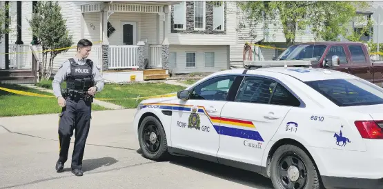  ?? GAVIN YOUNG ?? RCMP attended an address in the Lancaster neighbourh­ood of Red Deer Sunday, where they found a 39-year-old man and young girl dead inside.