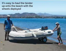  ??  ?? It’s easy to haul the tender up onto the beach with the wheels deployed