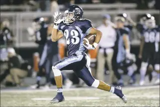  ?? JIM GENSHEIMER — STAFF PHOTOGRAPH­ER ?? Valley Christian’s Charlie Bostic scores on a 79-yard touchdown run in a highly satisfying triumph over visiting St. Francis on Friday night in a West Catholic Athletic League showdown.