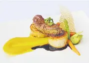  ??  ?? Seared scallops and foie gras with mash pumpkin at Piccolo restaurant, Royal Princess Larn Luang.