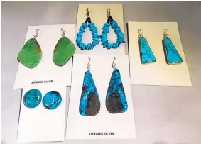  ?? ROSALIE RAYBURN/FOR THE JOURNAL ?? A selection of earrings made at Santo Domingo Pueblo for sale at Rio Grande Trading. Clockwife from top left, turquoise slab, $33; turquoise nugget loop, $87; turquoise slab, $69; turquoise slab, $39; turquoise circles, $36.