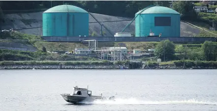  ?? — CP FILES ?? Kinder Morgan has federal approval to double the capacity of its pipeline that runs from Alberta to its terminal in Burnaby. The issue has exposed a schism within federal and provincial NDPers.