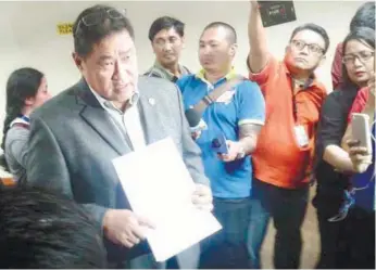  ?? (PNA FOTO) ?? THIRD COMPLAINT. Rep. Reynaldo Umali shows to media a copy of ethics complaint they file against Sen. Leila de Lima. The complaint, which is considered to be the third, was brought by Umali to the office of Senate Majority Leader and chair of the...