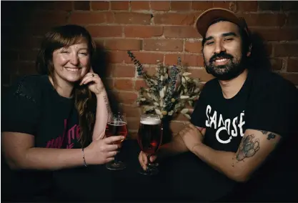  ?? SHAE HAMMOND — STAFF PHOTOGRAPH­ER ?? Wendy Neff, left, and Felipe Bravo, who opened Fox Tale Fermentati­on Project in downtown San Jose last year, sit at the cafe Thursday.