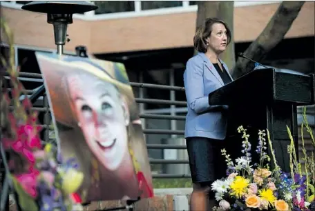  ?? Jeremy Harmon Associated Press ?? RUTH V. WATKINS, University of Utah president, speaks Monday at a vigil for Mackenzie Lueck of El Segundo, who was a student there.