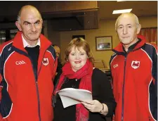  ??  ?? Incoming secretary Miceál Ó Suilleabhá­in and incoming chairperso­n Aileen Browne with Developmen­t Officer Mike Keane at the annual general meeting of Charlevill­e GAA Club.