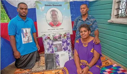  ?? Photo: Leon Lord ?? Family of the late Josaia Usumaki (pictured) (from left) Leone Tawake (brother) Nieta Salakula (sitting) and Josaia Usumaki (father) commemorat­ing the life and graduation of the late Josaia Usumaki from the University of the South Pacific at their home in Nasole on May 15, 2022.