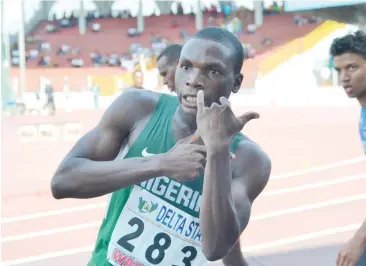  ??  ?? Nigerian youngster, Oduduru Ejowvoghen­e Divine celebrates after winning gold at the Africa Youth Athletics Championsh­ip in Warri