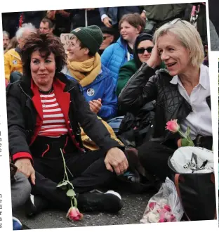  ??  ?? A bridge too far: Ruby Wax and Juliet Stevenson join a sit-in on Westminste­r Bridge, as others block roads in the capital