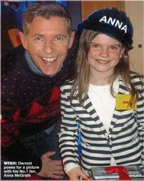  ??  ?? WISH: Dermot poses for a picture with his No.1 fan, Anna McGrath