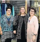  ?? Picture: WERNER HILLS ?? LADIES’ SHOPPING: Fashion fans, from left, Michelle Puggia, Mandy van Coller and Janice Mendelowit­z tried on Jenni Button designs at the designer’s popup shop next to Remo’s in the Baakens Valley this week