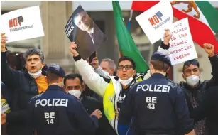  ??  ?? AN IRANIAN opposition group protests outside a meeting of the JCPOA Joint Commission in Vienna last week. (Leonhard Foeger/Reuters)