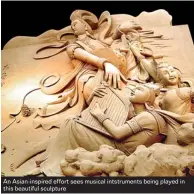  ??  ?? An Asian-inspired effort sees musical intstrumen­ts being played in this beautiful sculpture